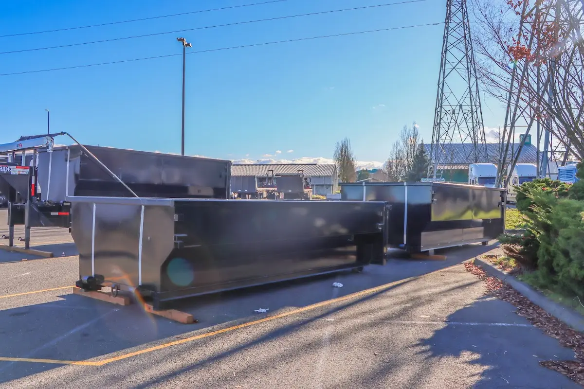 Roll-off dumpster ready for waste disposal at job site for Residential Dumpster Rental in Napoleon